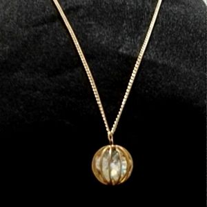 Vintage Originalities Inc. NY.&.NY Gold tone Cage Pendant with AB Crystals